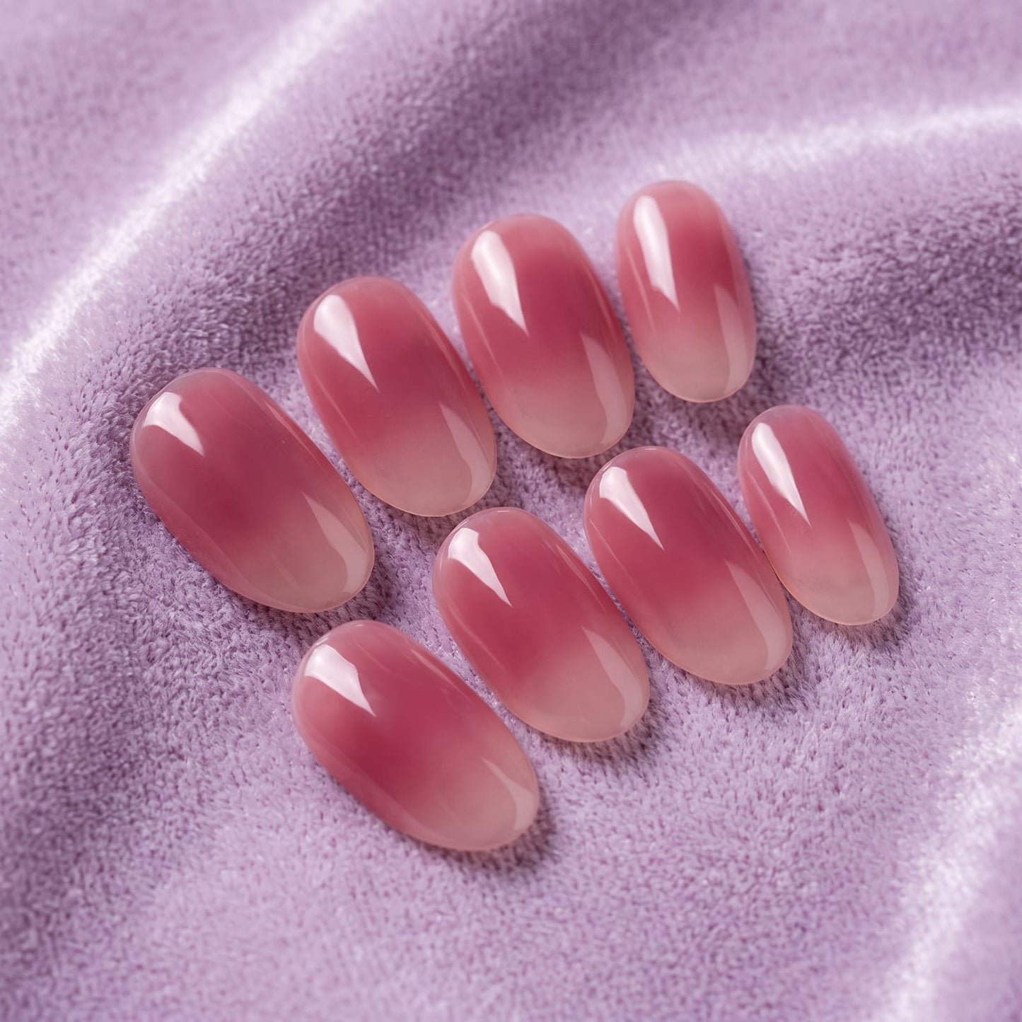 Blush gradient nails on hands
