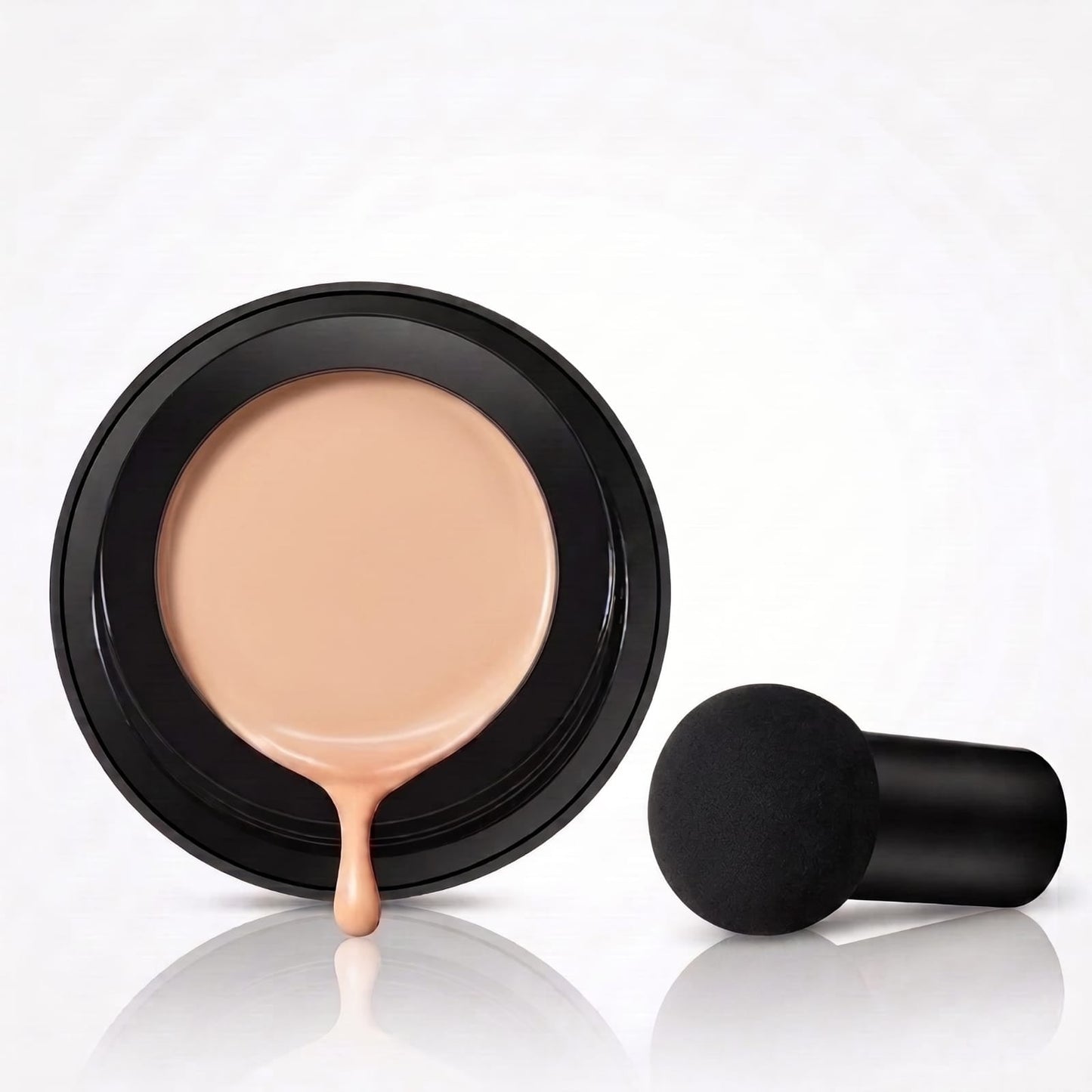 Mushroom head air cushion foundation compact open with sponge applicator beside it