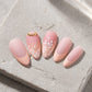 French tip almond nails close up
