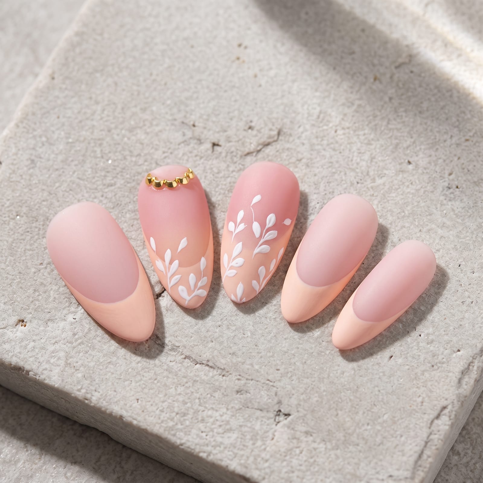 French tip almond nails close up
